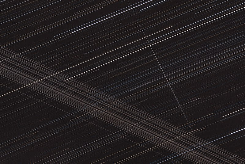 Space-X's Starlink satellites overlapping the comet NEOWISE.