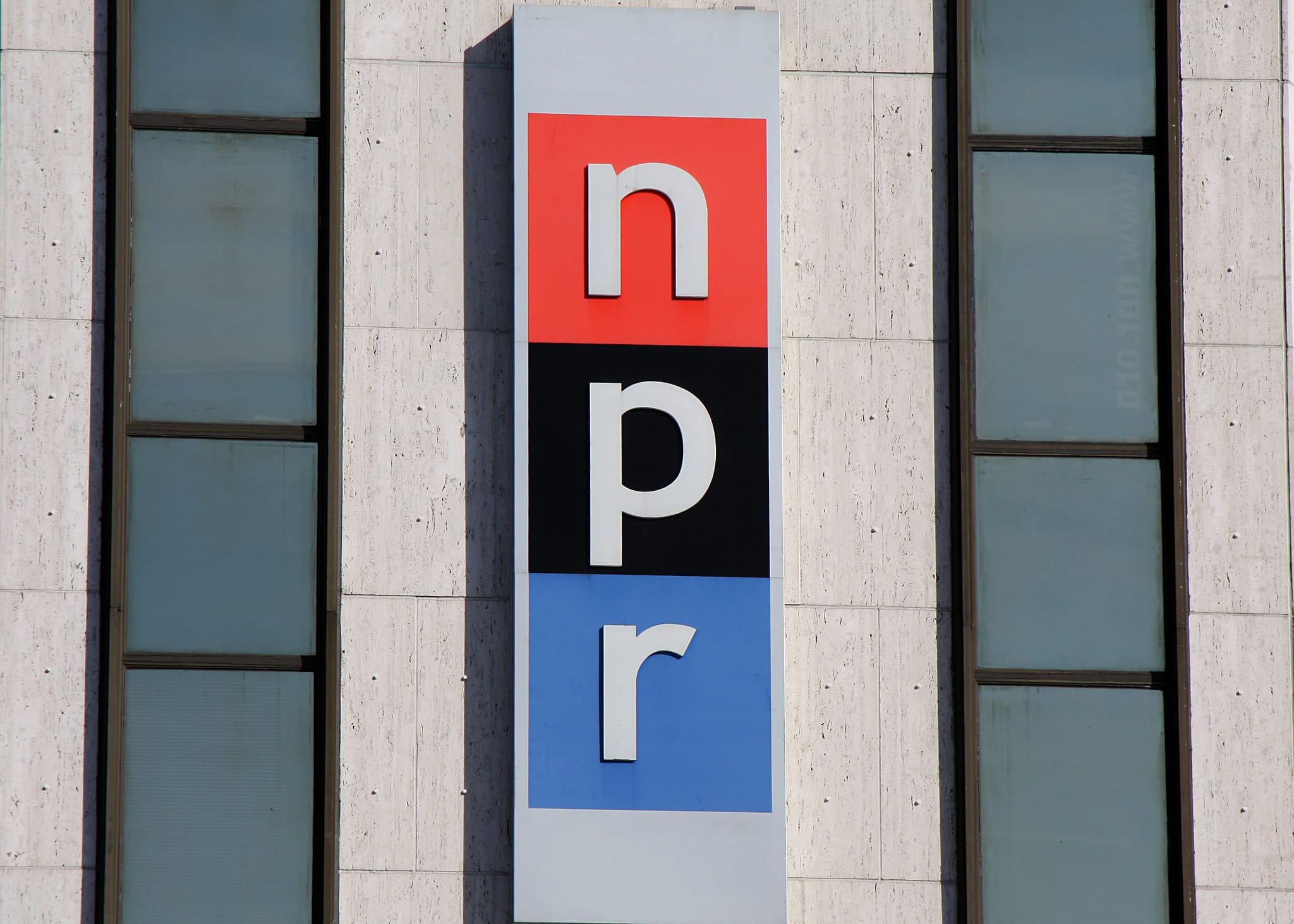 An image of NPR's logo placed on a building.