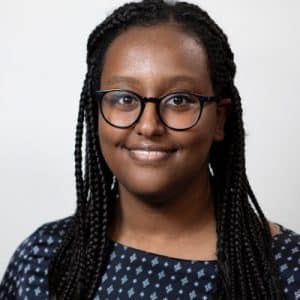 A headshot of Naomi Andu.