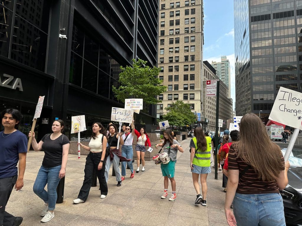 Strikeworkers at Business Insider march during their June strike.
