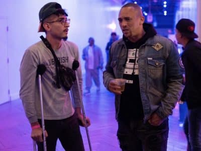 Chazaro, left, interviews musical artist Kev Choice, right.