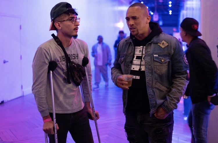 Chazaro, left, interviews musical artist Kev Choice, right.